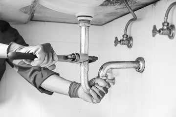 technician-plumber-using-wrench-repair-water-pipe-sink_101448-4182-2